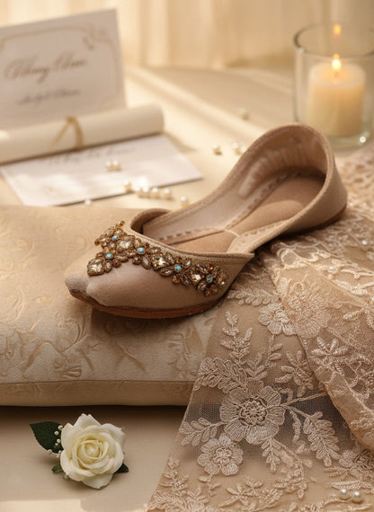 Ujaala Aarya beige velvet jutti embellished with intricate mirror diamond work and turquoise accents.