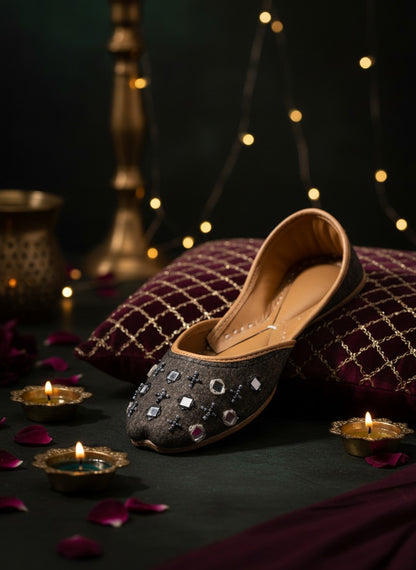 Ujaala Zarqa black cotton jutti with mirror and bead embellishments, leather sole.