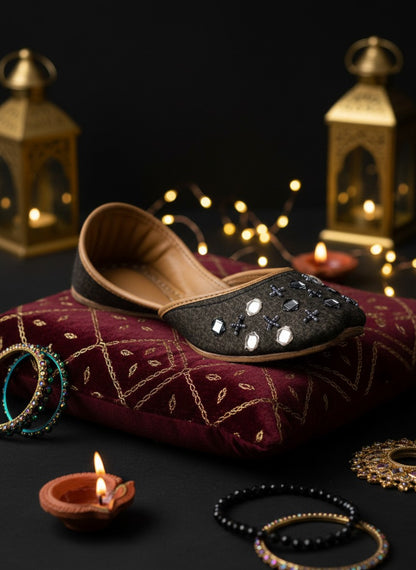 Ujaala Zarqa Black Jutti with mirror and bead detailing on cotton upper and leather sole.