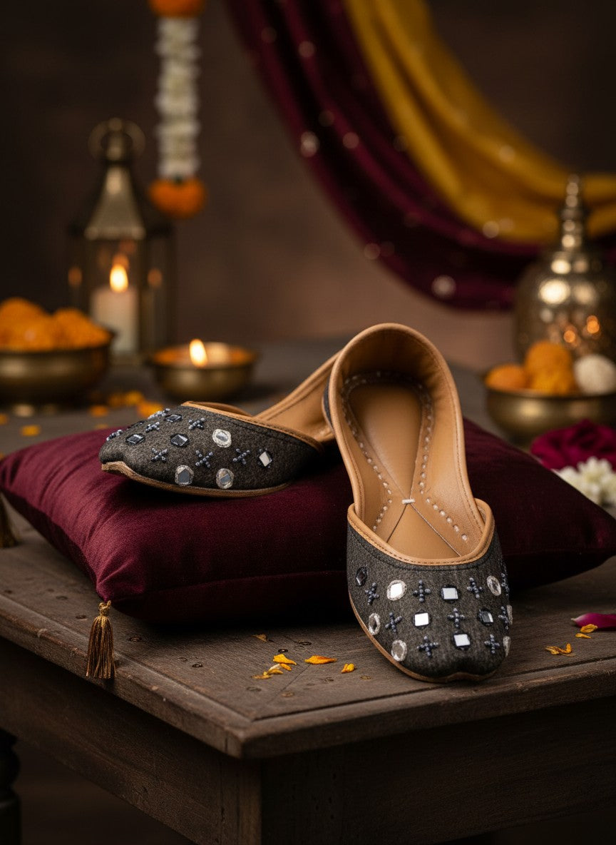 Ujaala Zarqa Black Jutti with mirror and bead detailing on cotton upper and leather sole.