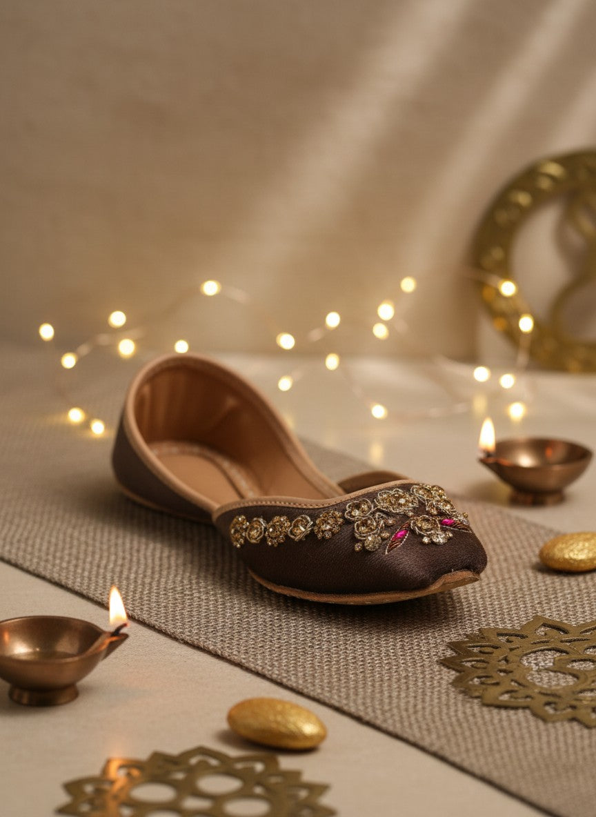 Ujaala brown suede Punjabi juttis for women with intricate gold and pink bead embroidery.