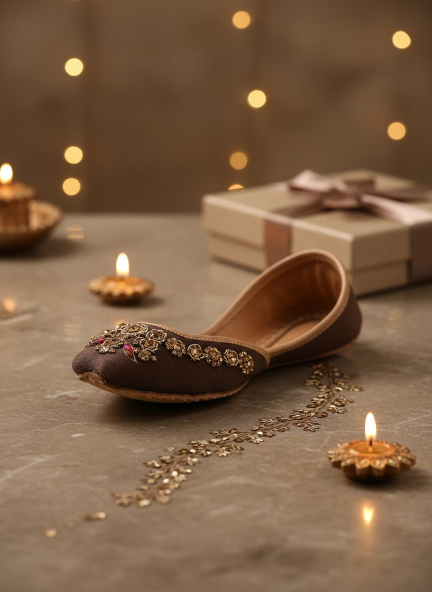 Ujaala brown suede Punjabi juttis for women with intricate gold and pink bead embroidery.