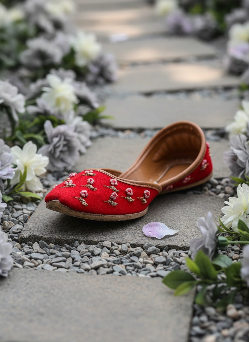 Ujaala Gulaab Cherry Jutti: red embroidered flats with floral detail, traditional Indian footwear.