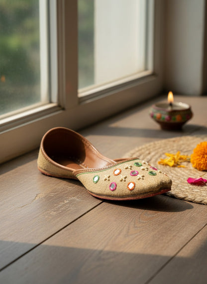 Ujaala Zarqa golden beige jutti with multicolor mirror and embroidery details. Traditional festive footwear.