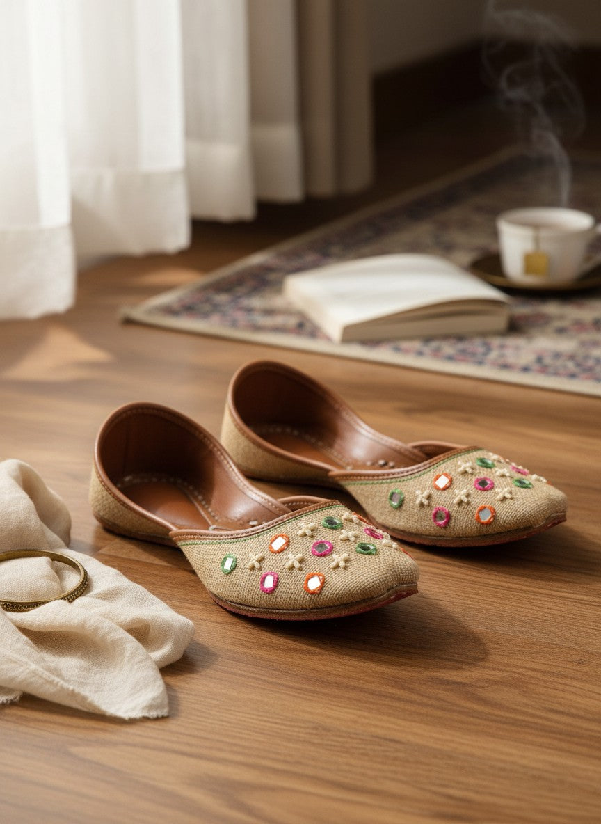 Ujaala Zarqa golden beige jutti with multicolor mirror and embroidery details. Traditional festive footwear.