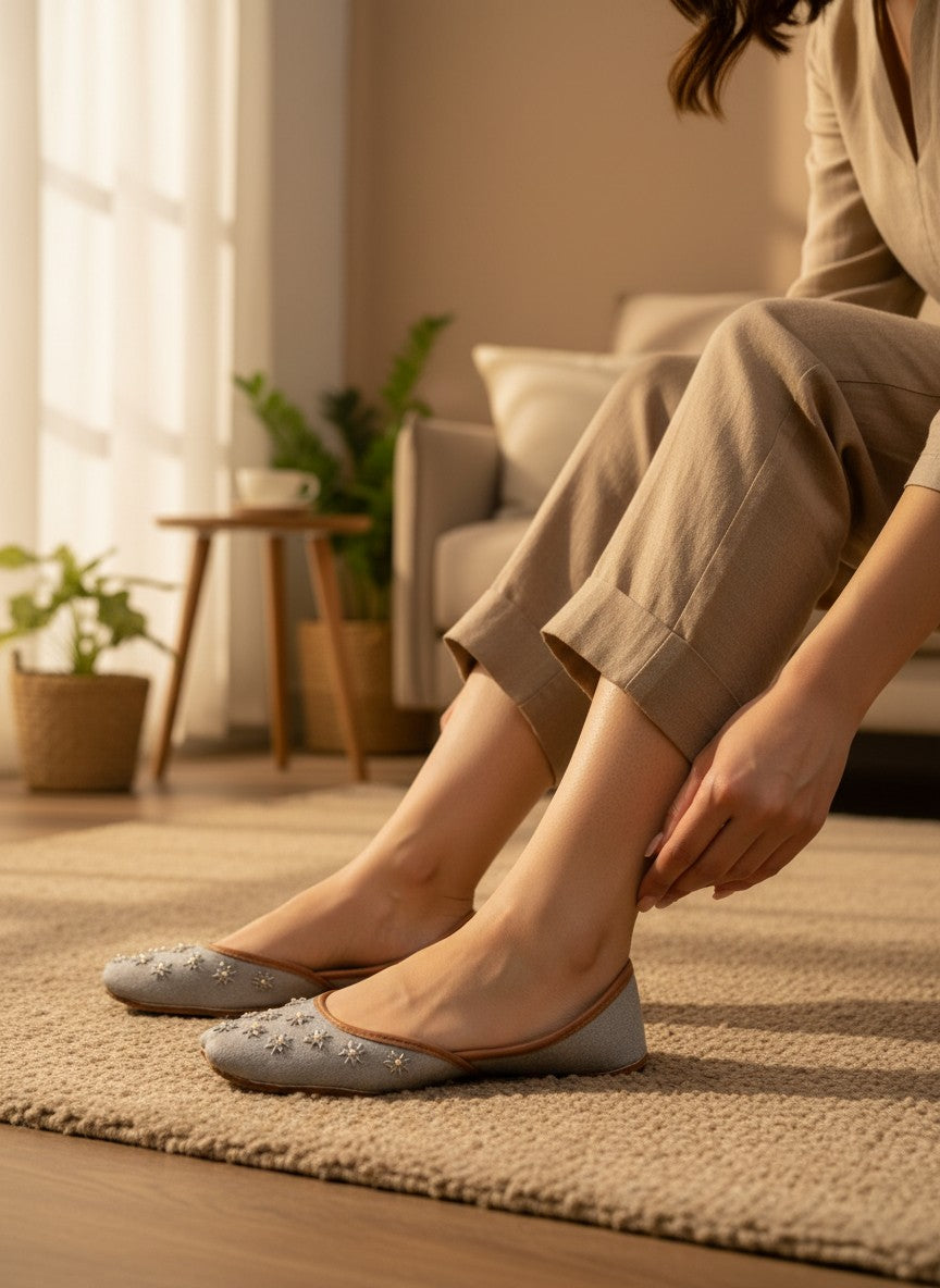 Ujaala Gulzaar silver-grey jutti with delicate pearl and thread embroidery on the toe.