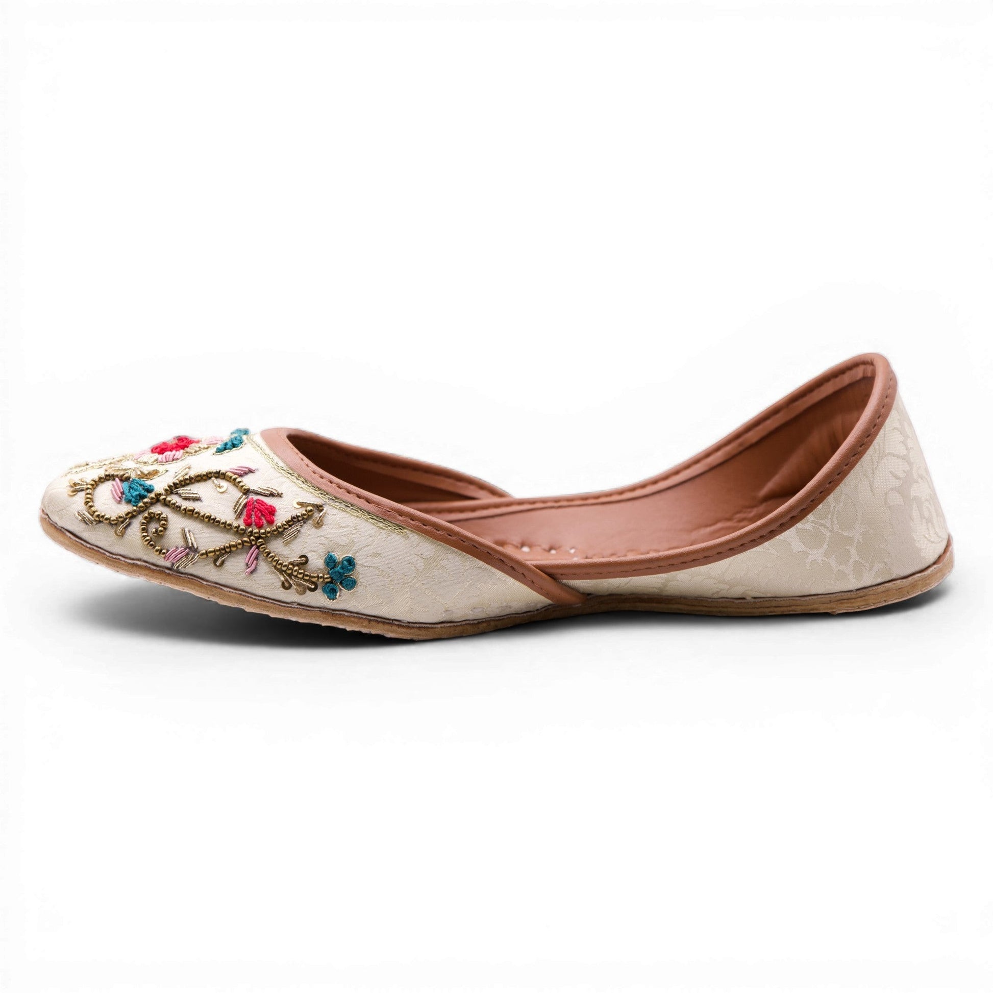 Ujaala Gulkaar ivory jutti with floral embroidery, vibrant threadwork, and mirror accents. Perfect for festive occasions.