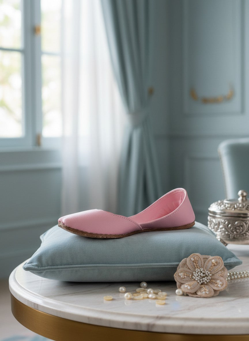 Ujaala Noora pink plain pure leather jutti flat shoe with a rounded toe.