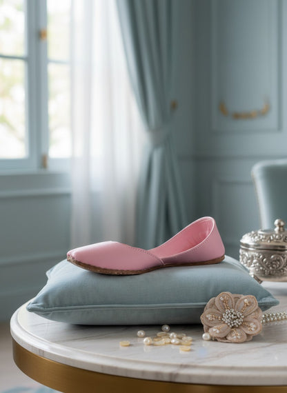 Ujaala Noora pink plain pure leather jutti flat shoe with a rounded toe.