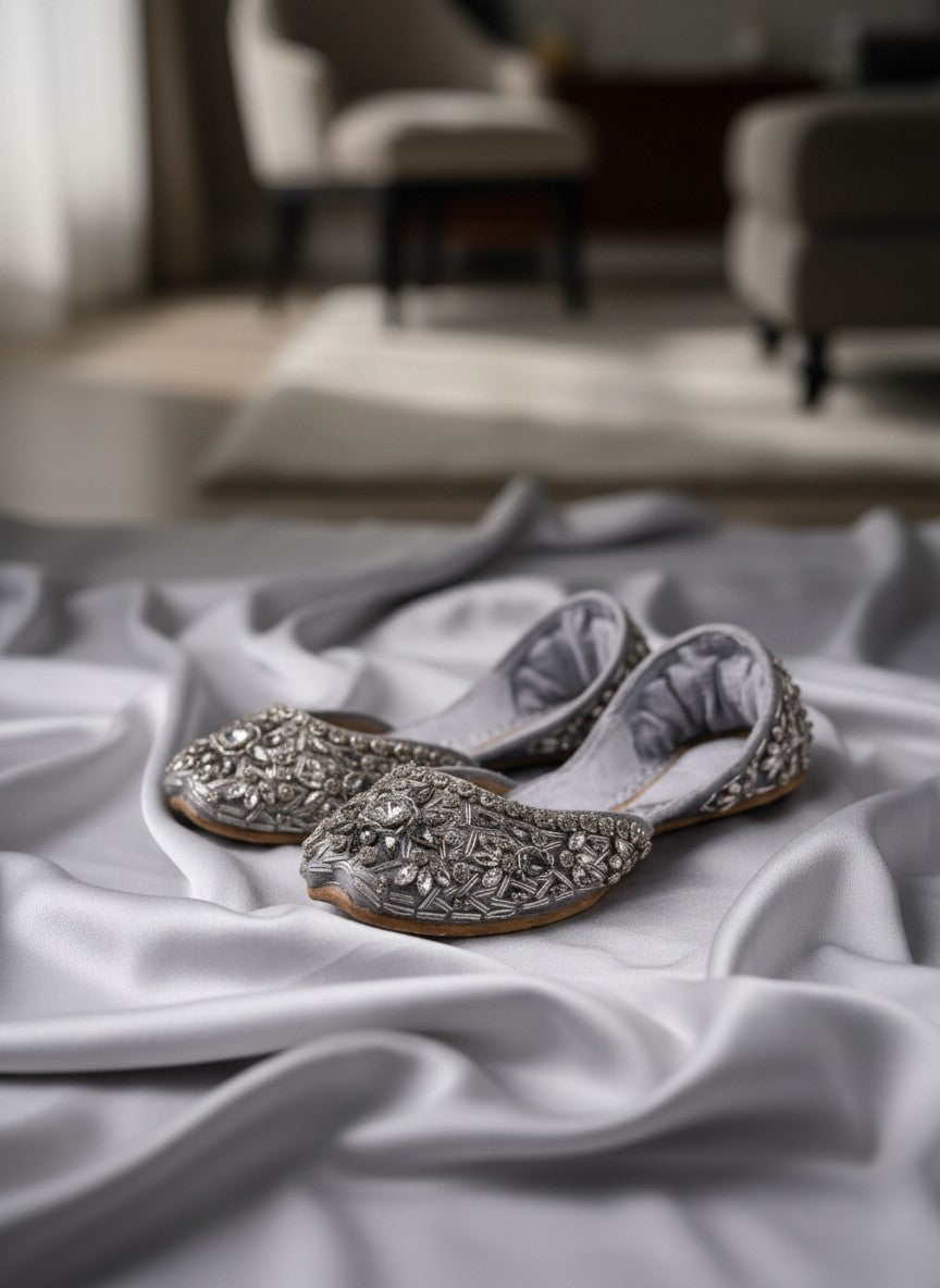 Ujaala Noorjahan silver embellished jutti flats with intricate beadwork and crystal details.