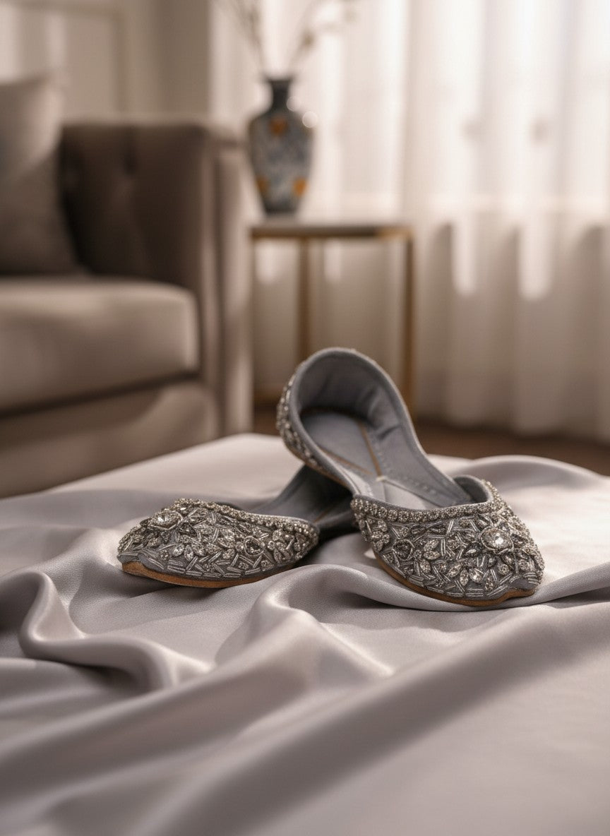 Ujaala Noorjahan silver embellished jutti flats with intricate beadwork and crystal details.