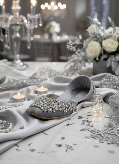 Ujaala Aurora silver velvet jutti embellished with clear rhinestones. Elegant flat shoes for women.
