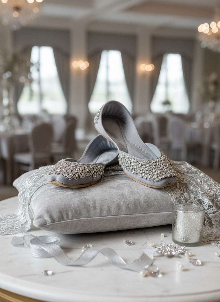 Ujaala Aurora silver velvet jutti embellished with clear crystals and beads. Elegant flat shoes for women.