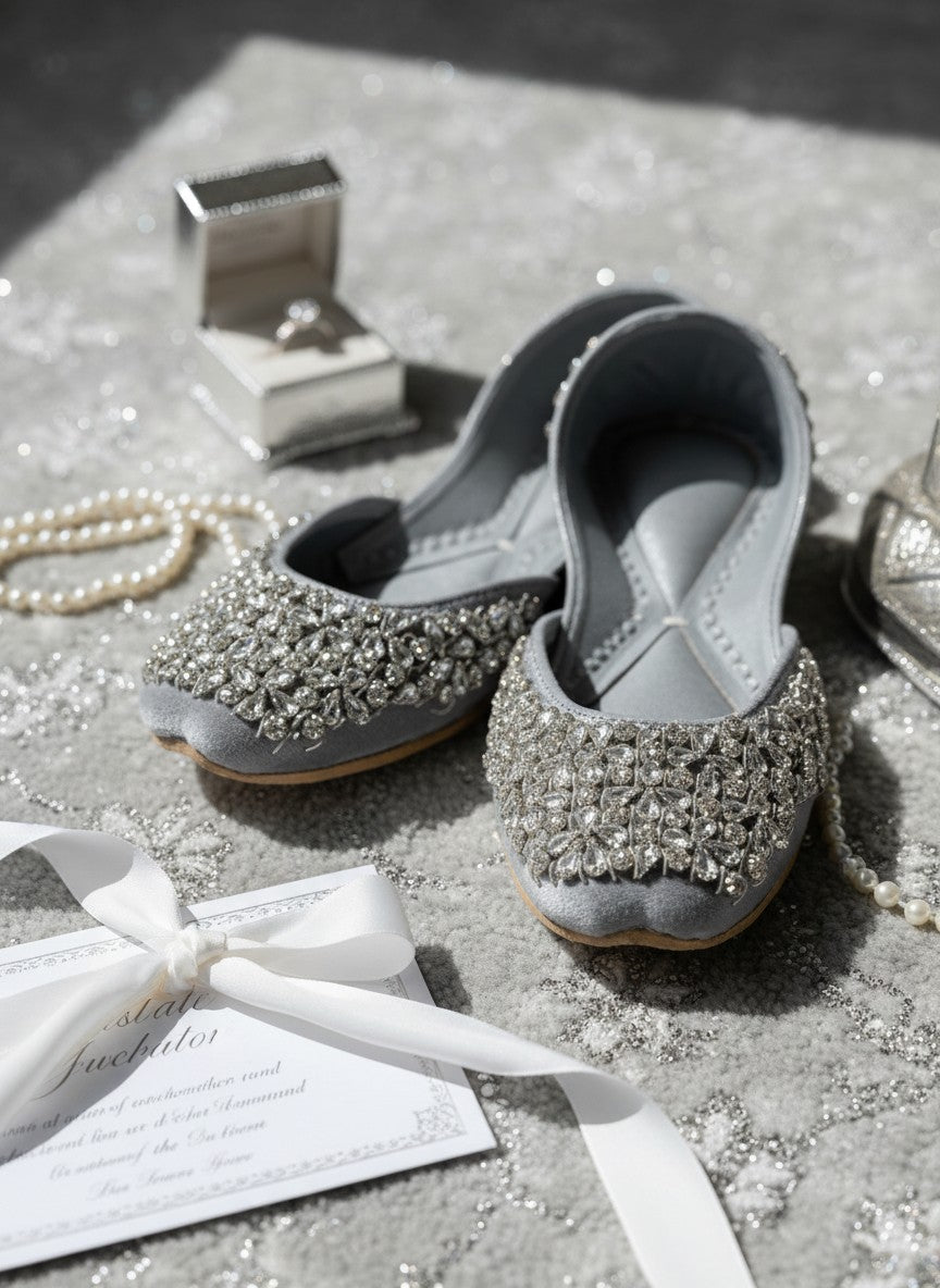 Ujaala Aurora silver velvet jutti embellished with clear crystals and beads. Elegant flat shoe for women.