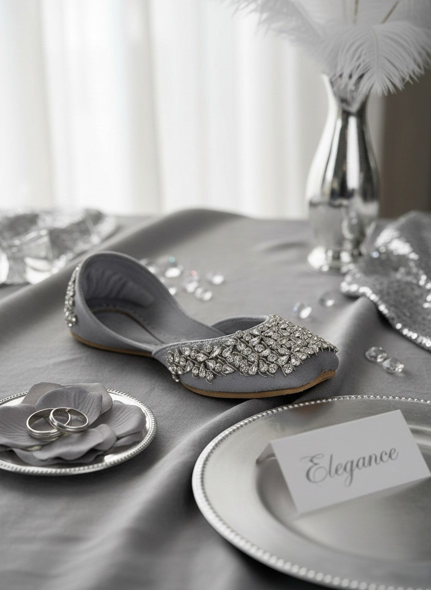 Ujaala Aurora silver velvet jutti embellished with clear crystals and beads. Elegant flat shoe.